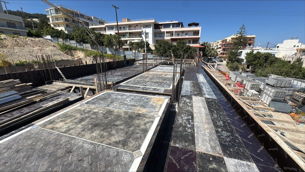 The slab formwork, with the neighbouring buildings in the background.