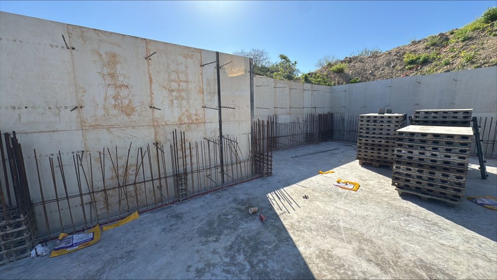 The basement retaining walls after the formwork was removed.
