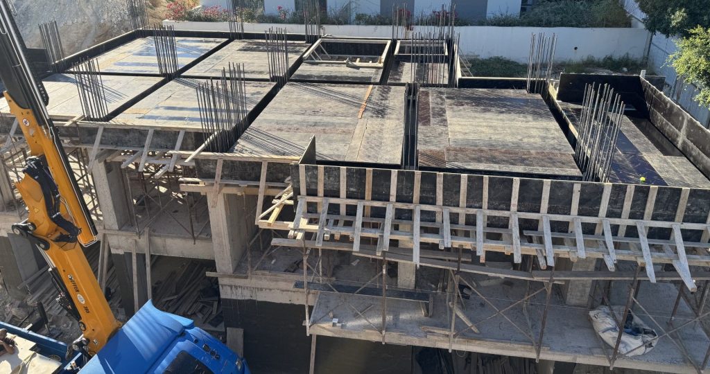 Formwork for a floor slab, with the crane alongside.