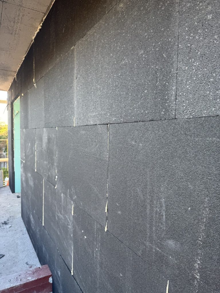External thermal insulation boards on the wall.