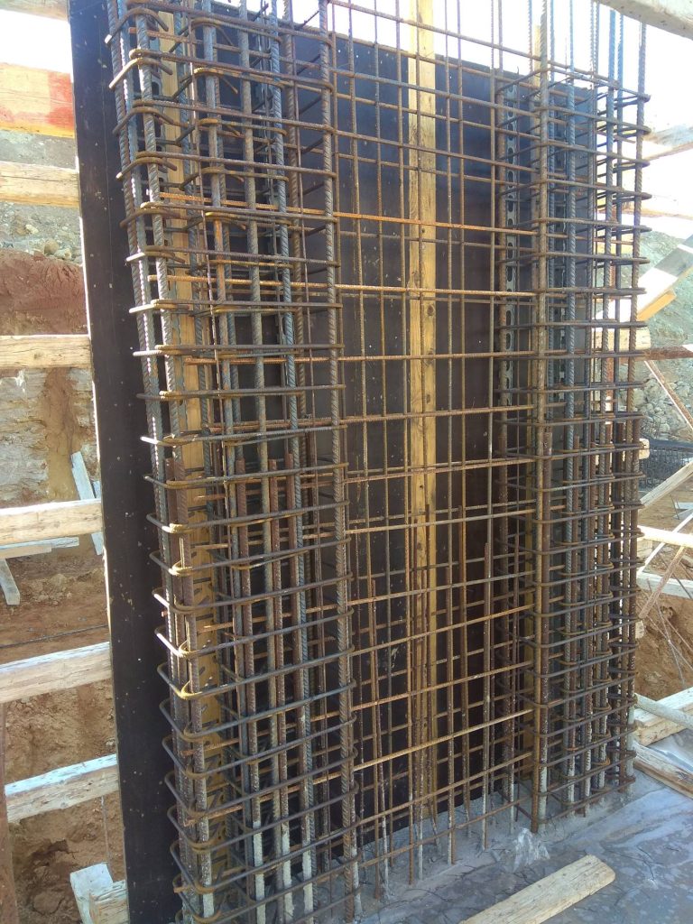 The reinforcement for a reinforced concrete shear wall, before the formwork goes up.