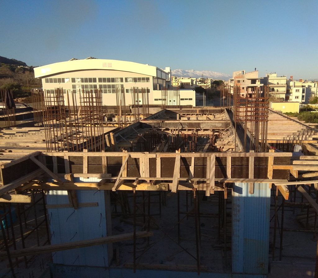 The formwork for a floor slab, with the column reinforcement.