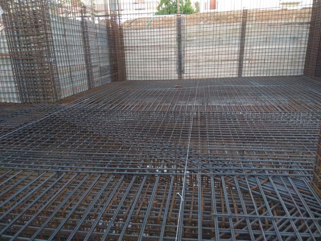 The completed reinforcement for the raft foundation and the basement walls.