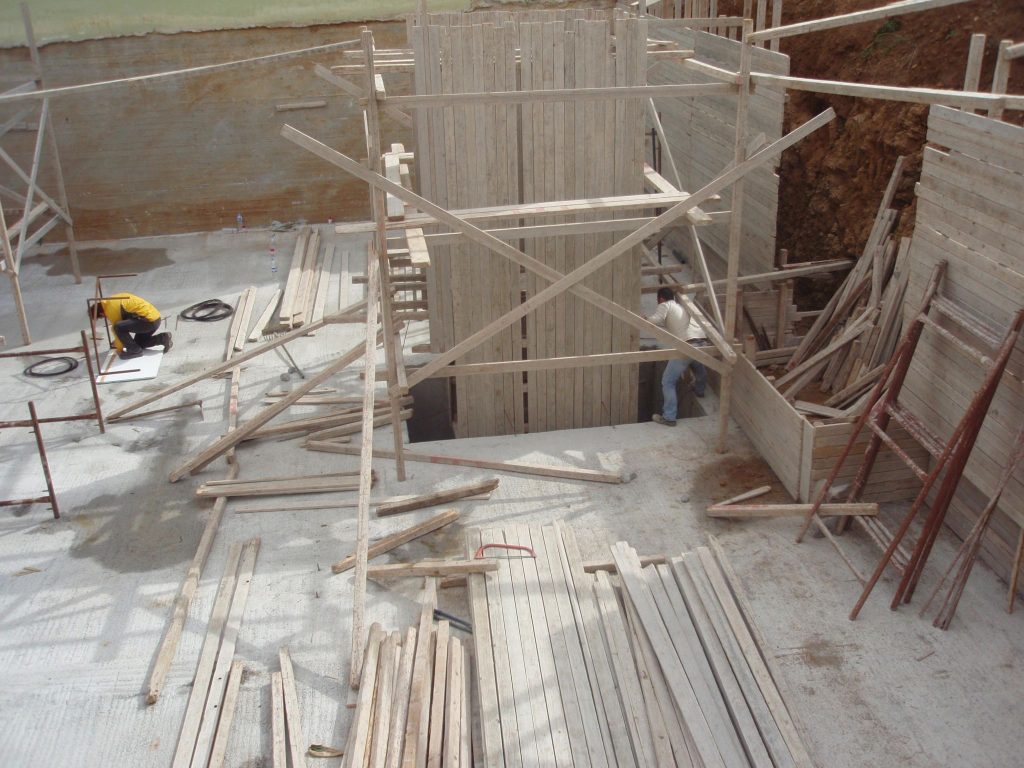 A crew working on the formwork on the slab.
