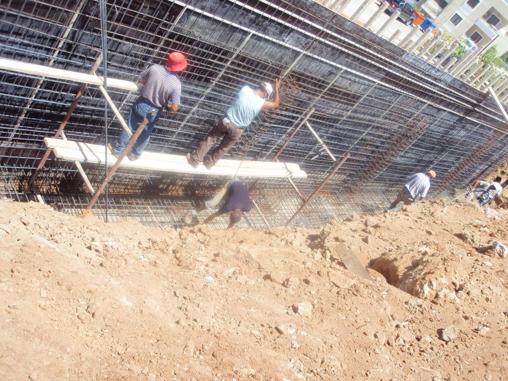 A crew on the reinforcement, before the concrete pour.