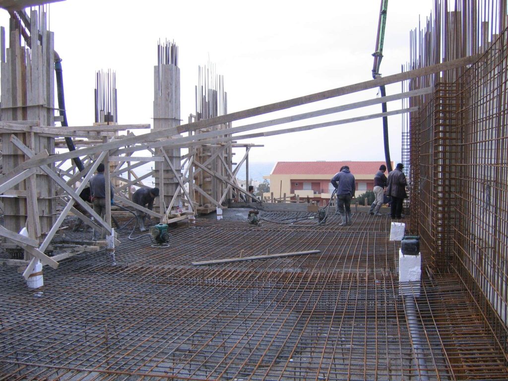 The slab reinforcement with the columns and formwork, before the concrete pour.