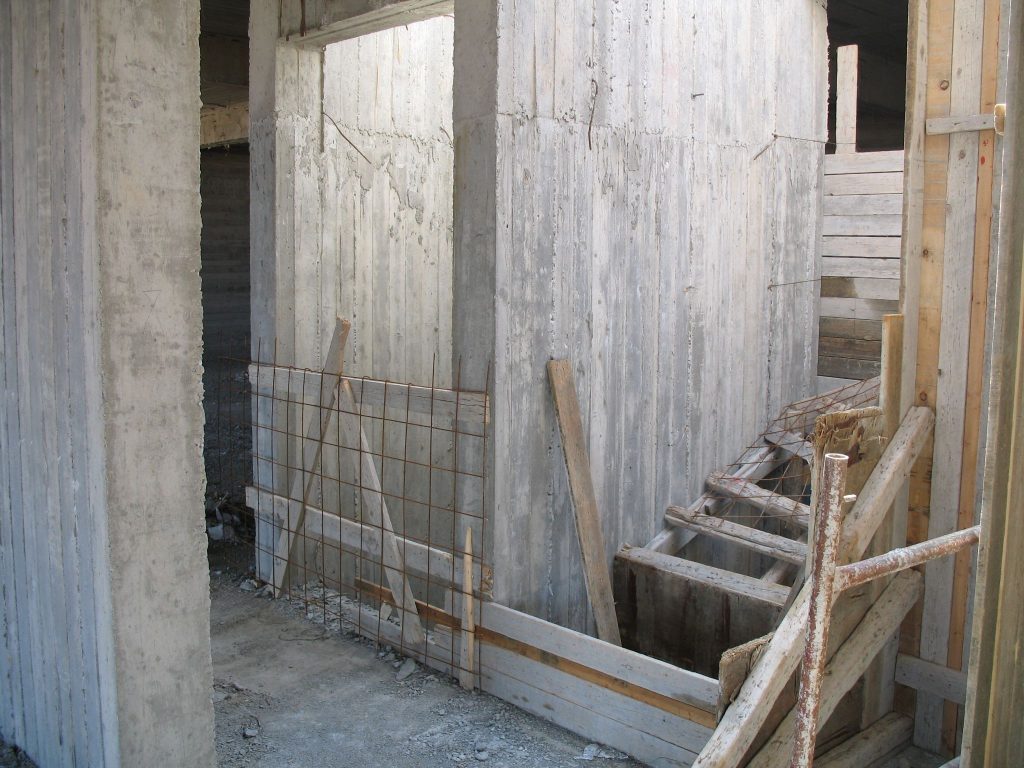Reinforced concrete walls on the lowest level of the building, after the formwork was removed.