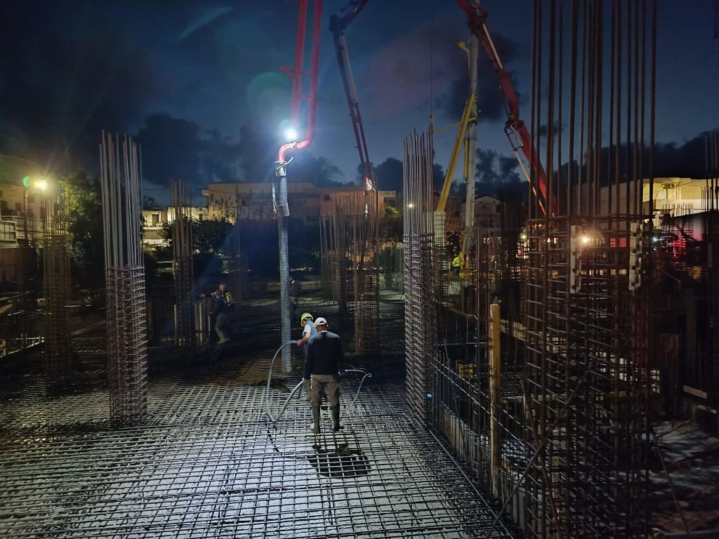Pouring the foundation before sunrise, under the site lighting.