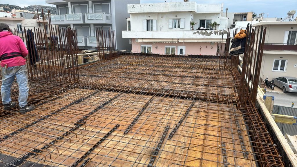 A crew placing the slab reinforcement.